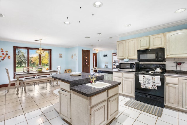 kitchen featuring black appliances, light tile patterned flooring, sink, and a kitchen island with sink