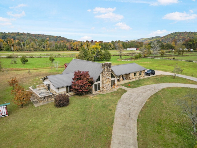 aerial view featuring a mountain view and a rural view