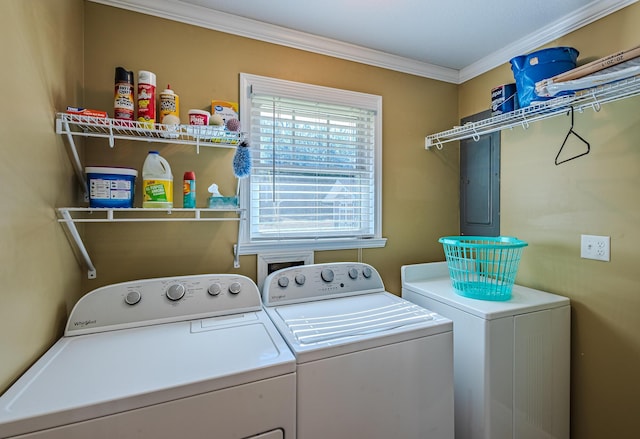 washroom with washer and clothes dryer and ornamental molding