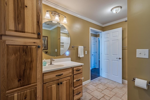 bathroom with vanity and crown molding