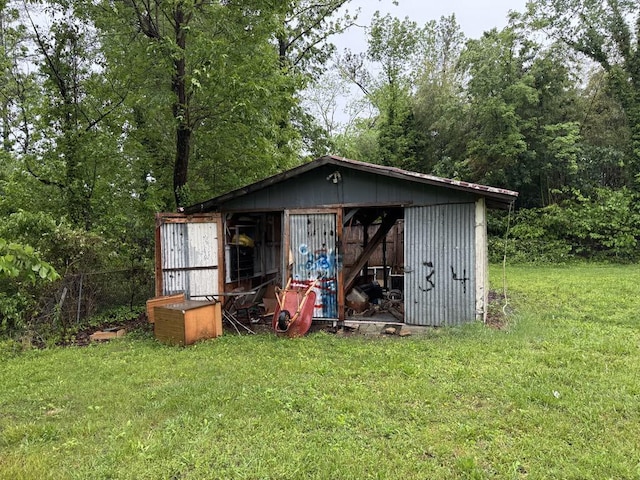 view of shed featuring fence