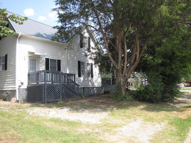 exterior space featuring metal roof