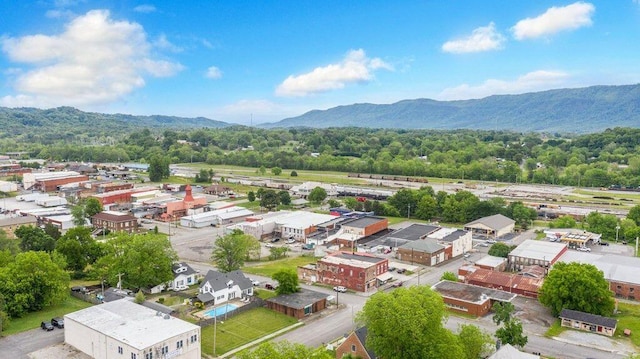 drone / aerial view featuring a mountain view