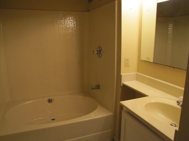 bathroom with shower / washtub combination and vanity