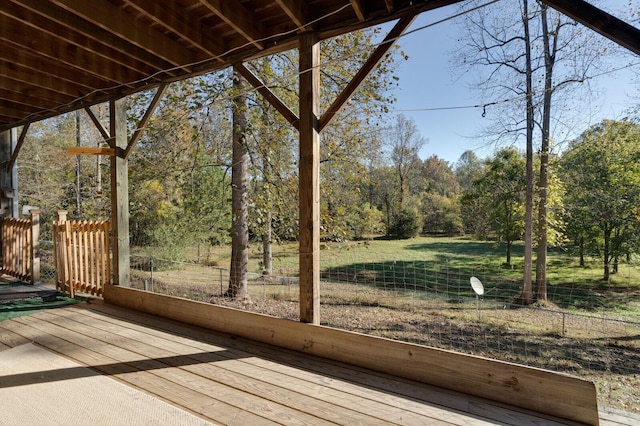 wooden terrace with a forest view