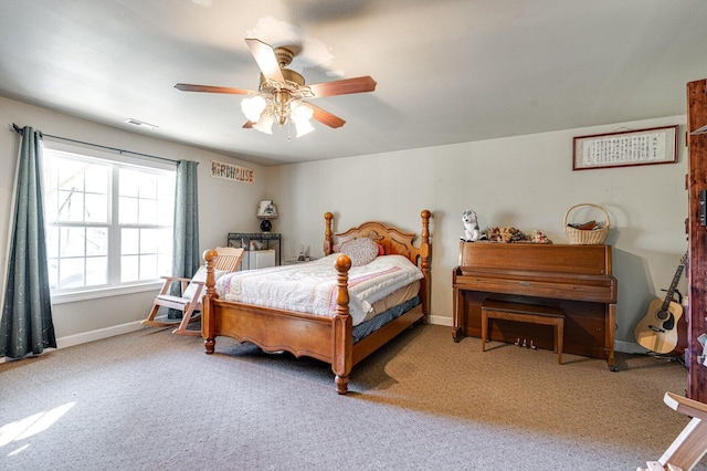 bedroom featuring baseboards, visible vents, ceiling fan, and carpet flooring