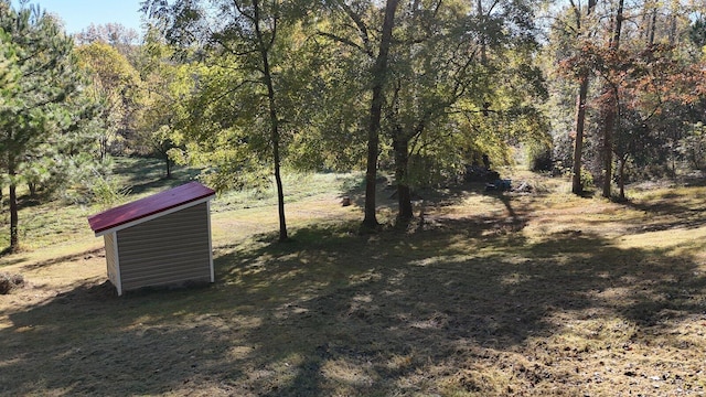 view of yard featuring a view of trees