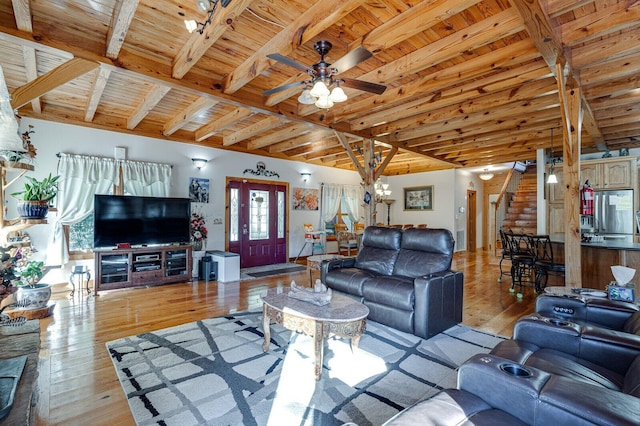 living room with stairs, wooden ceiling, and hardwood / wood-style flooring