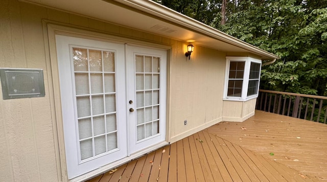 wooden terrace featuring french doors