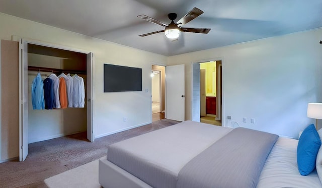 carpeted bedroom with a closet and ceiling fan