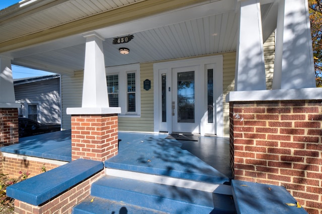 entrance to property with a porch