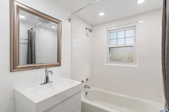 bathroom with vanity and shower / tub combo