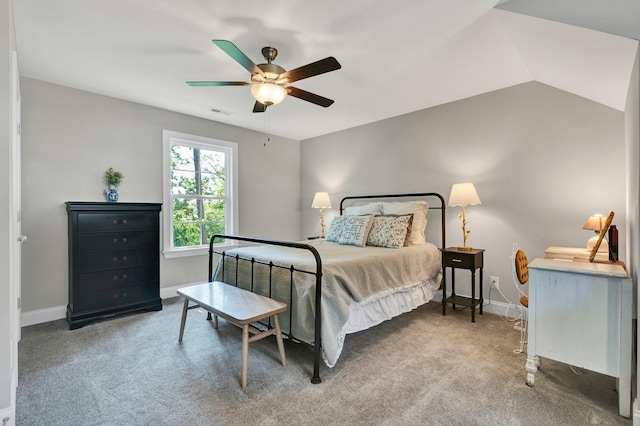 carpeted bedroom with baseboards and a ceiling fan