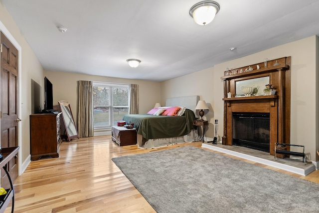 bedroom with light hardwood / wood-style flooring