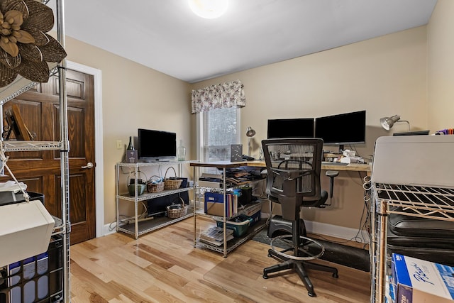 office area with hardwood / wood-style flooring