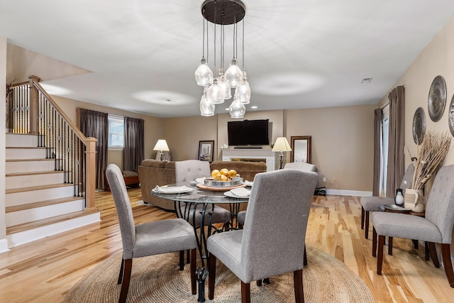 dining room with light hardwood / wood-style floors