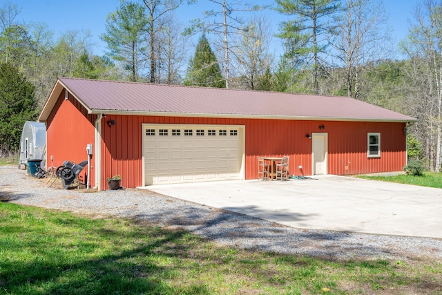 garage featuring driveway