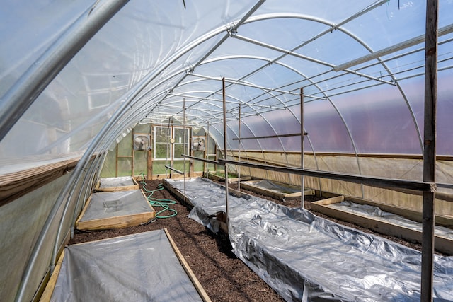 exterior space featuring a greenhouse