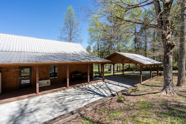 view of home's community featuring a carport and driveway