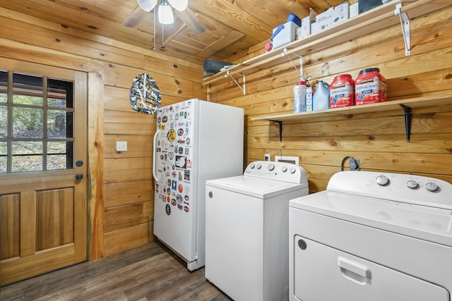 laundry area featuring laundry area, wood walls, dark wood-style floors, washer and clothes dryer, and wooden ceiling
