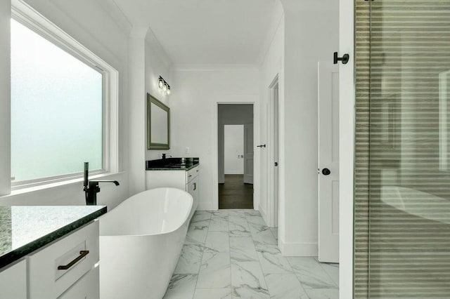 bathroom with ornamental molding, shower with separate bathtub, and vanity