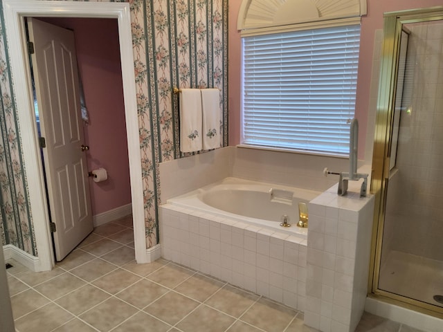 bathroom featuring separate shower and tub and tile patterned floors