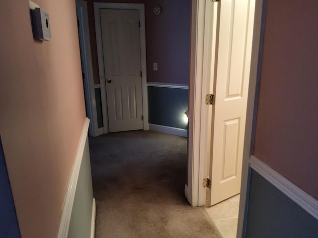 hall with light carpet