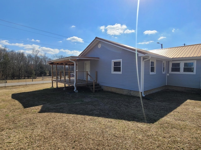 view of property exterior with a lawn