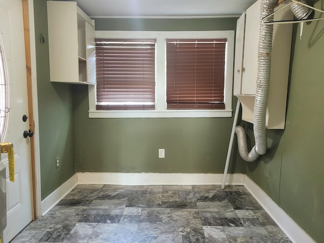 washroom featuring cabinets