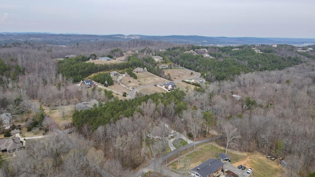 bird's eye view featuring a view of trees