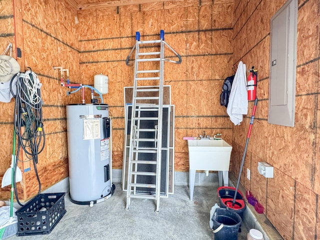 utility room with electric panel and water heater