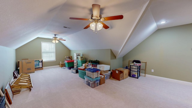 rec room with visible vents, lofted ceiling, baseboards, and carpet flooring