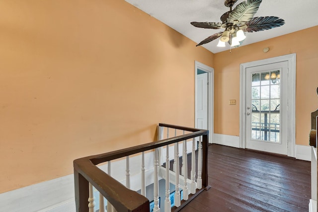 interior space featuring wood-type flooring and ceiling fan