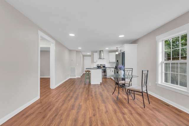 1050 King Edward Ave SE, Cleveland, TN 37311 - dining space with dark wood-type flooring and recessed lighting