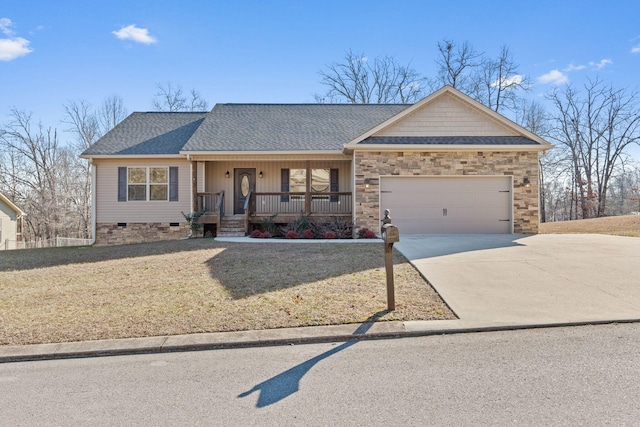 ranch-style house with a porch and a garage