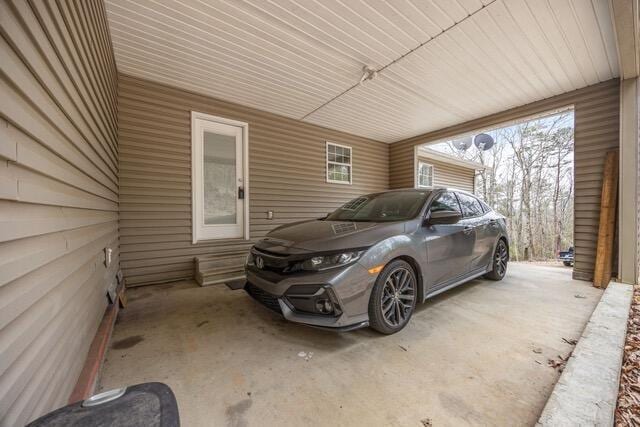 view of patio / terrace with a carport