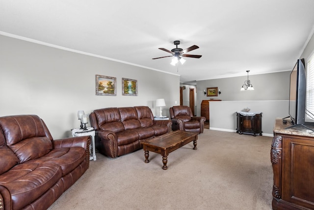 living area featuring crown molding, ceiling fan with notable chandelier, baseboards, and light carpet