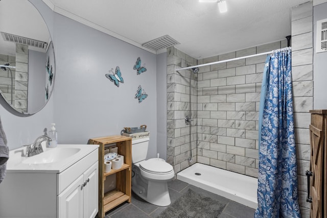 full bath featuring vanity, a shower stall, and toilet