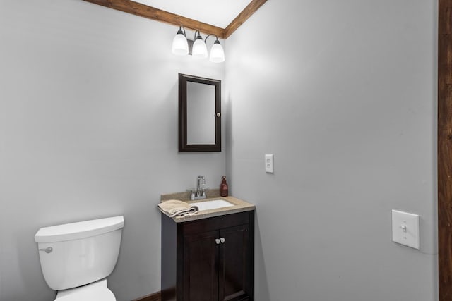 half bath with toilet and vanity