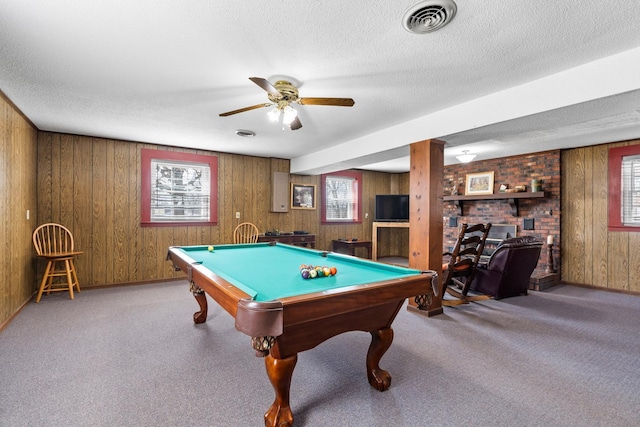 rec room with a textured ceiling, pool table, visible vents, and light carpet