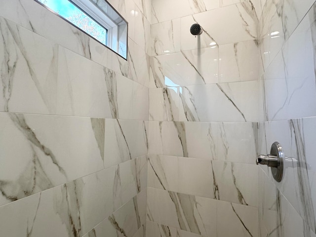 details with a tile shower