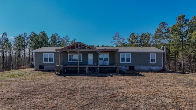 view of front of house featuring crawl space