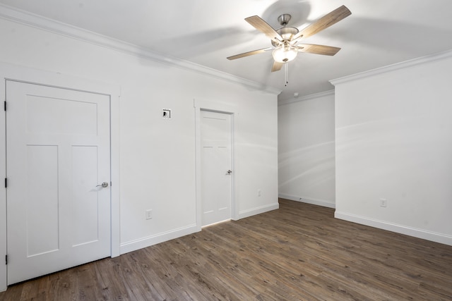 unfurnished room with dark hardwood / wood-style floors, ceiling fan, and ornamental molding