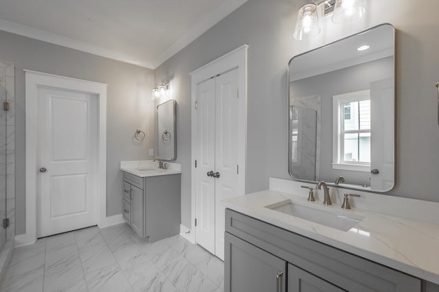 bathroom featuring a shower stall, a closet, crown molding, and a sink