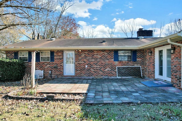 rear view of house featuring a patio area