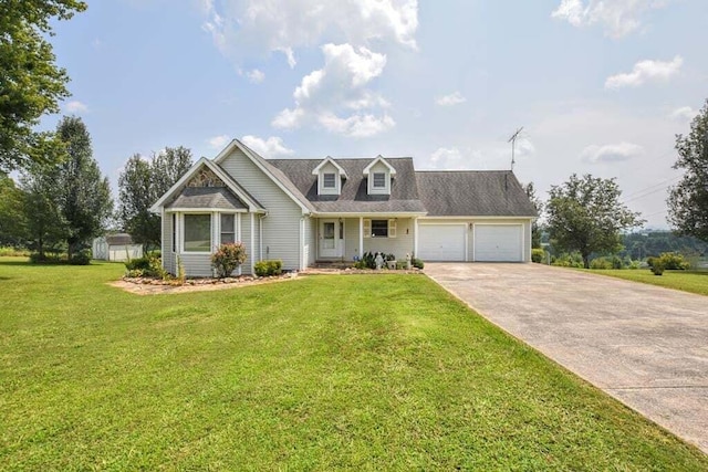 view of front facade with a garage and a front lawn