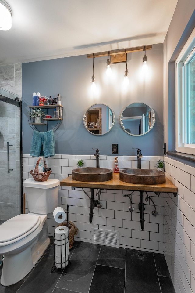 4701 Maywood Ln, Chattanooga, TN 37416 - bathroom featuring tile walls and a stall shower
