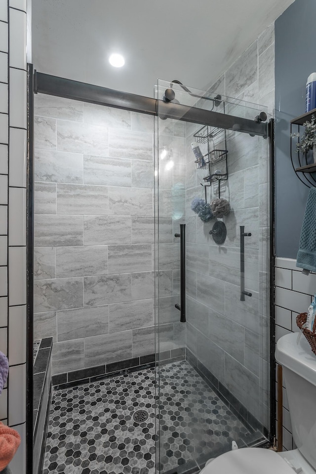 4701 Maywood Ln, Chattanooga, TN 37416 - bathroom with a shower stall and tile walls