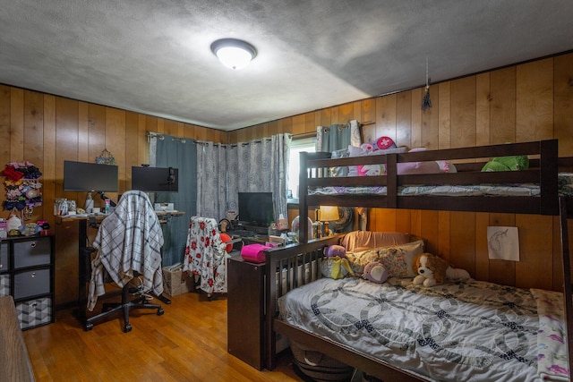 4701 Maywood Ln, Chattanooga, TN 37416 - bedroom featuring wood walls and wood finished floors