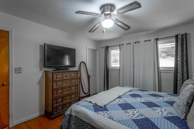 4701 Maywood Ln, Chattanooga, TN 37416 - bedroom featuring multiple windows, wood finished floors, and ceiling fan
